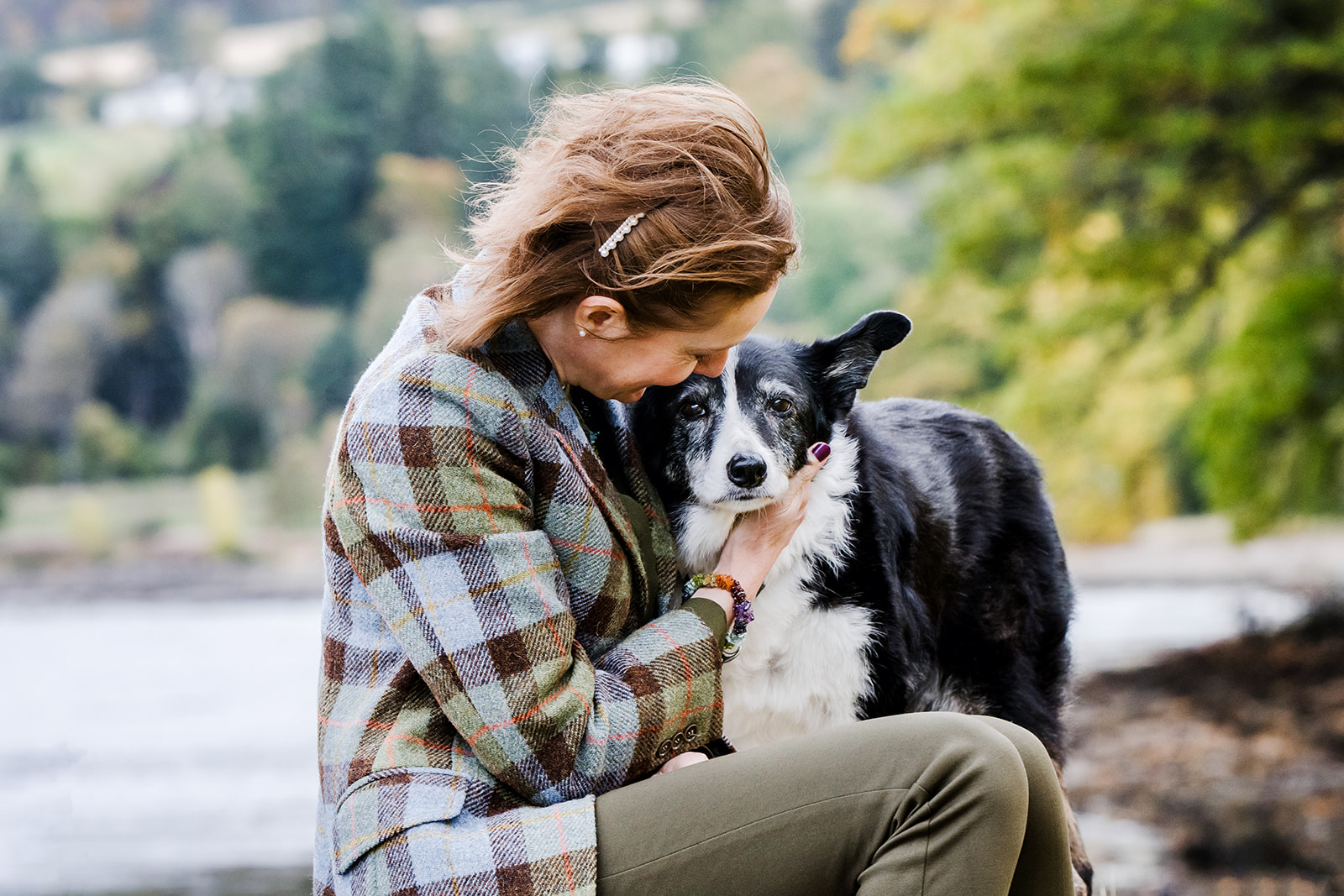 Owner and dog cuddling