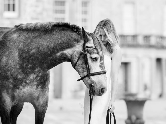 Horse and owner in a wedding dress