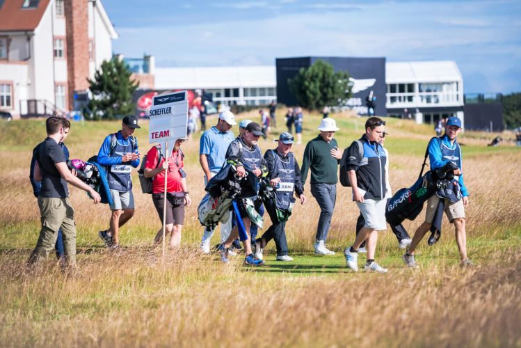 Team Scheffler walking away from first tee